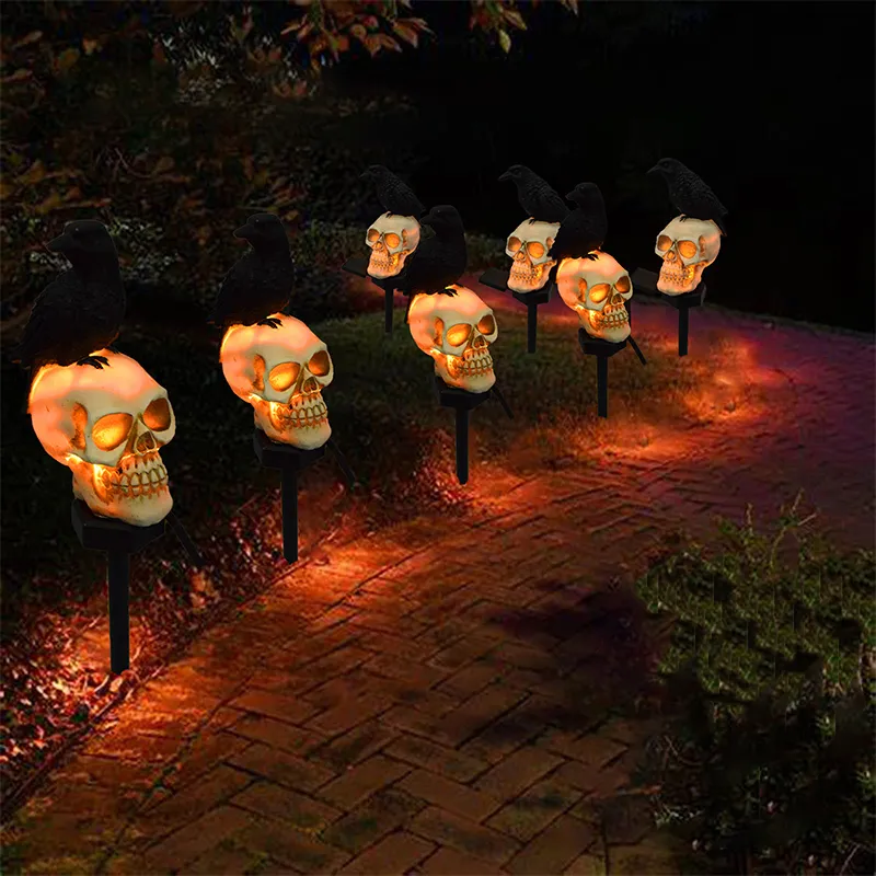 Set 2 lampi solare LED pentru gradina, craniu cu cioara