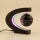 Glob pamantesc plutitor care leviteaza, Negru